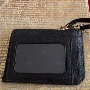 Kate Spade black leather wristlet.